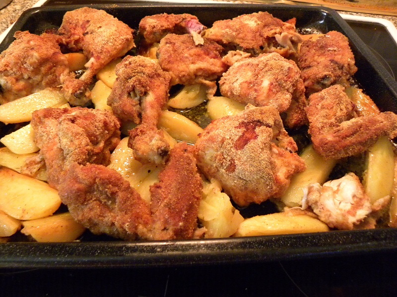 Κοτόπουλο πανέ στο φούρνο με πατάτες εικόνα