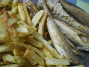 Fish and fried potatoes image