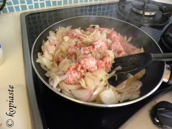 sauteing onions with sausage