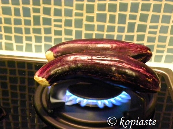 Charring eggplants