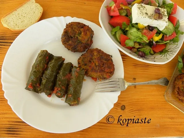 Veggie burgers - dolmades and Greek salad