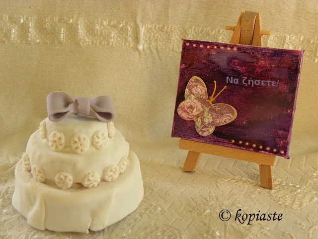Mini wedding cake with purple painting